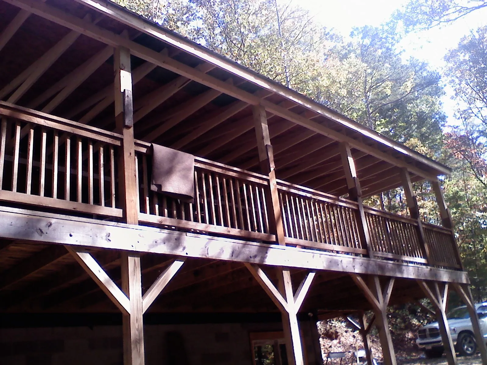 Timber framing under a new elevated porch and deck — Roof Leak Repair in Glencoe by Roofing Brothers